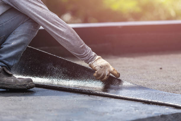 Professional Exterior Waterproofing technician working in Boston, GA